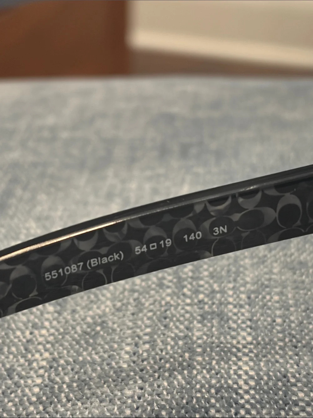 Coach Black Cat-Eye Sunglasses with Dark Lenses